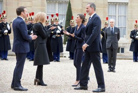 French President Emmanuel Macron greeted Spain's king and queen with Namaste.